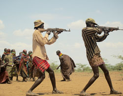 Young Turkana men will gather from all around to participate in large raids. 