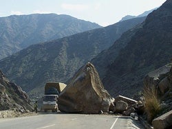 Eventually this truck sized boulder will be broken down into sand sized grains. Image by Sven Dirks. 