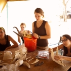 Cleaning fossils and bones from the field work